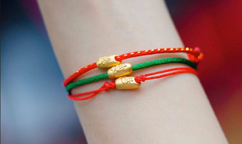 Vòng tay hạt gạo vàng 24K chỉ đỏ