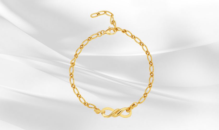 Lắc tay nam vàng 18K 3 chỉ với thiết kế mắc xích có biểu tượng vô cực mang ý nghĩa về sự vĩnh cữu vô hạn trong tình yêu