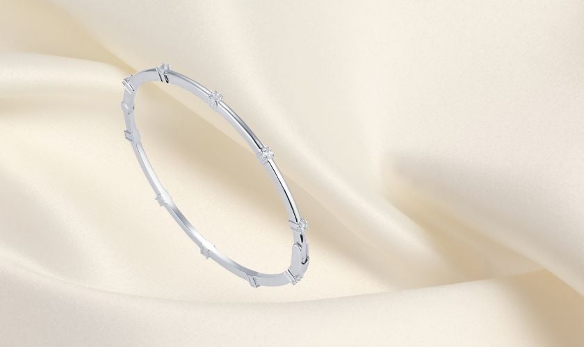 Lắc tay nữ vàng trắng trơn bản dẹp có đính đá xung quanh