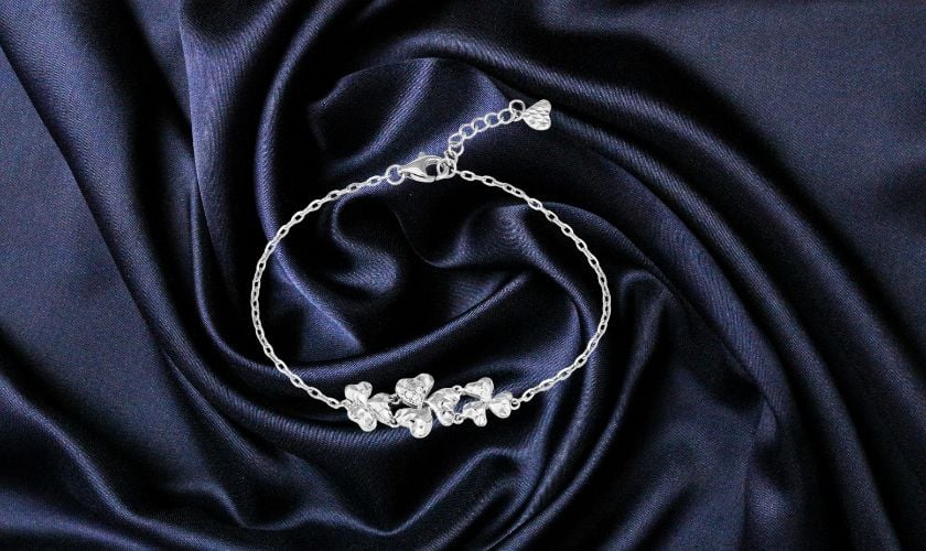 Lắc tay nữ vàng trắng Ý 18K mặt hoa lan đính đá