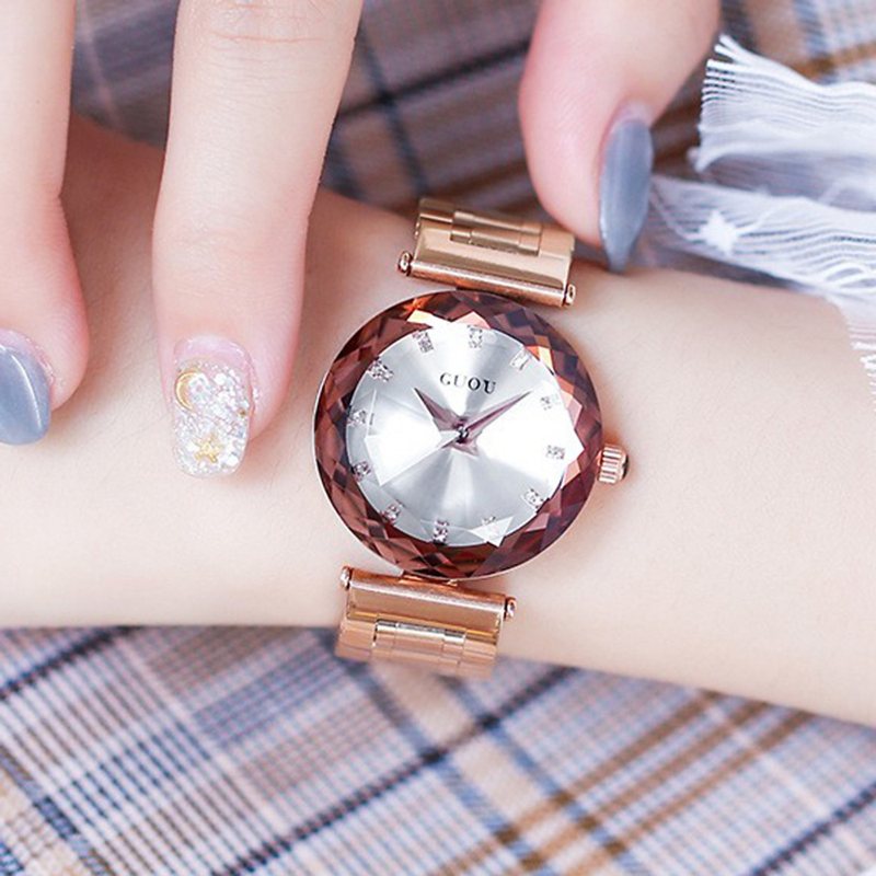 dong ho guou day kim loai